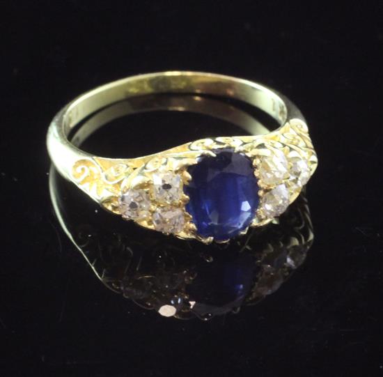 An early 20th century 18ct gold, sapphire and diamond elliptical shaped ring, size Q.